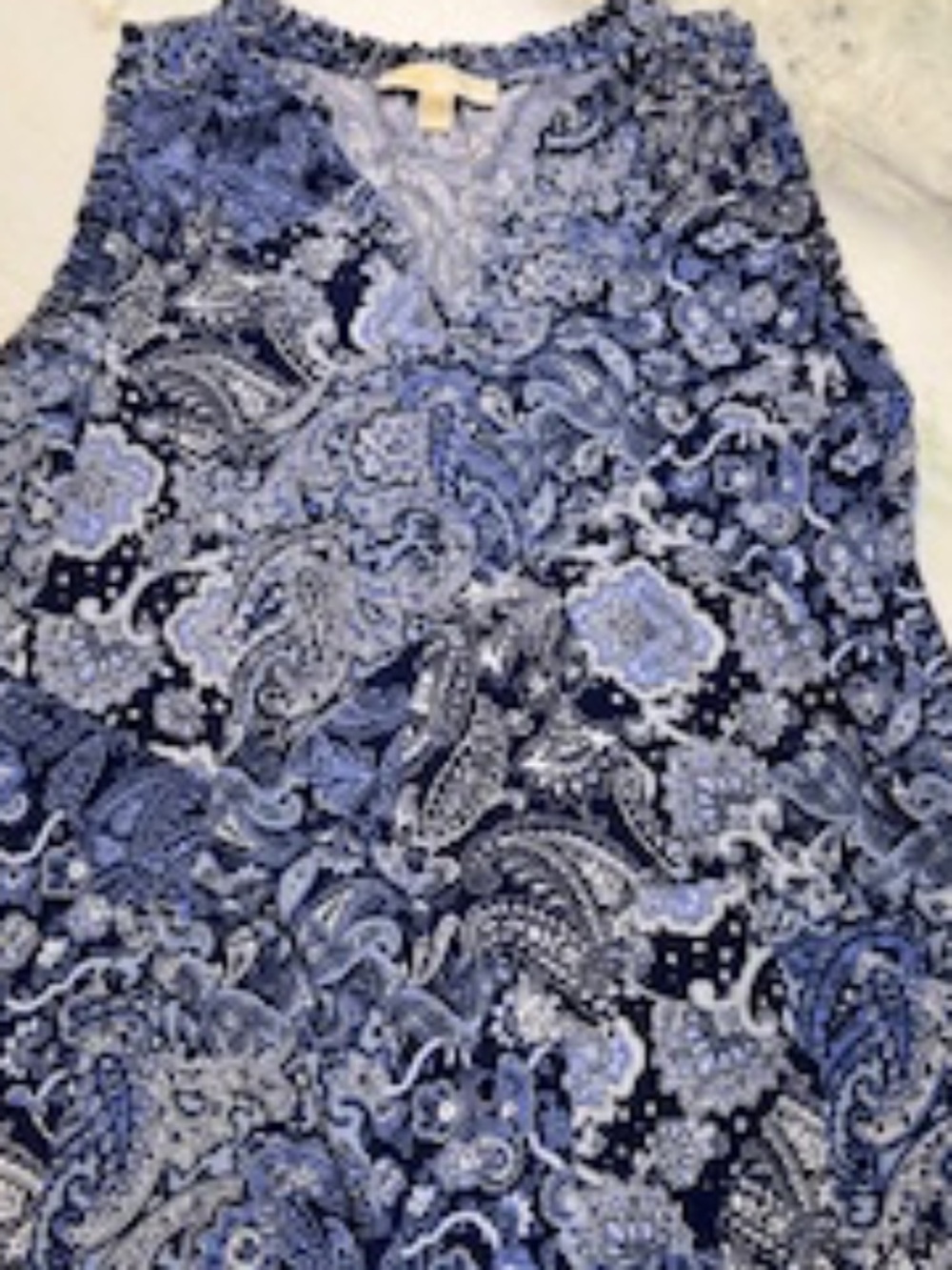 Michael Kors sleeveless blouse.